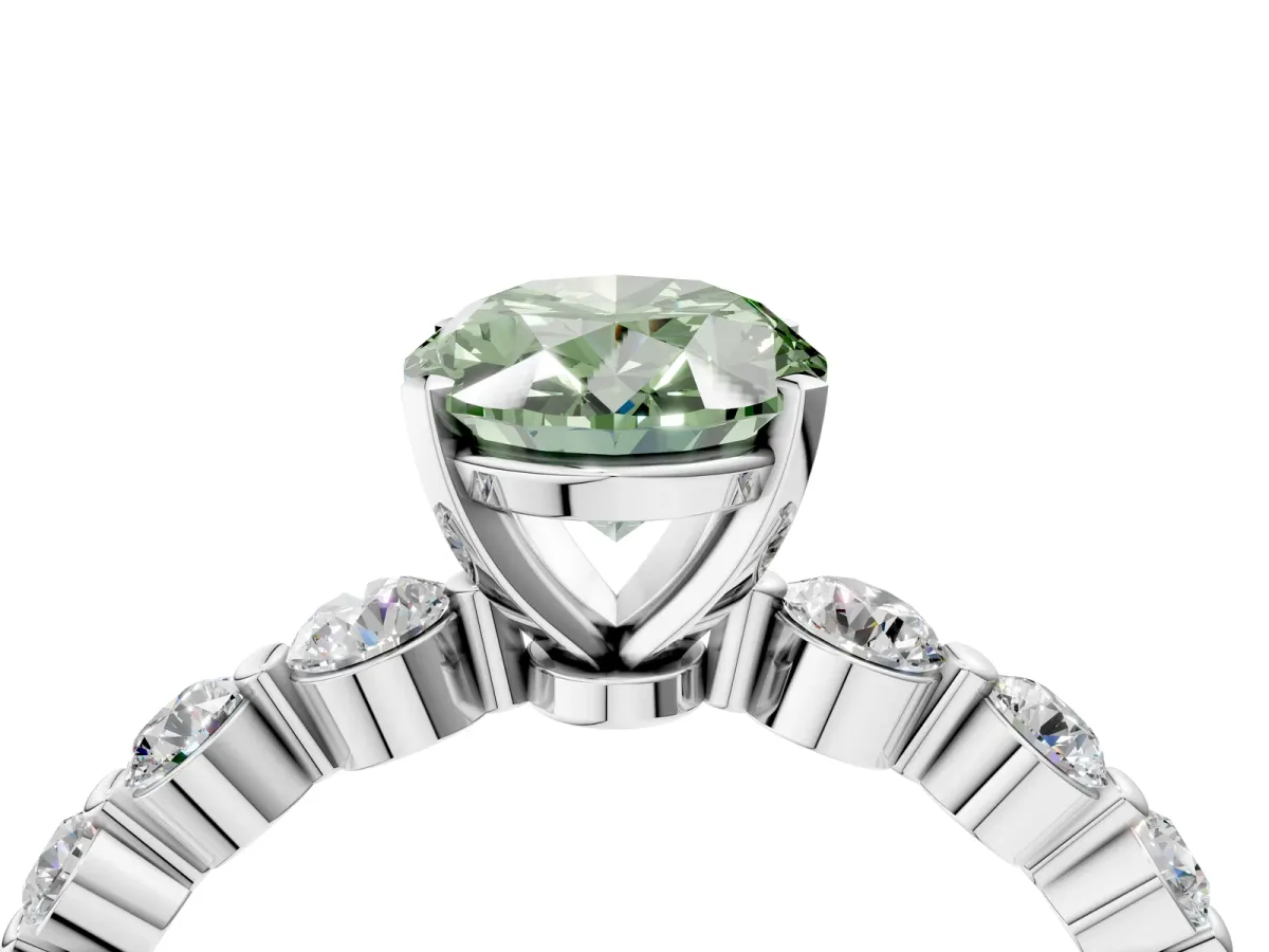 Fancy Green Oval Cut Solitaire Diamond Ring with Pave Band and Four-Prong Setting Silver