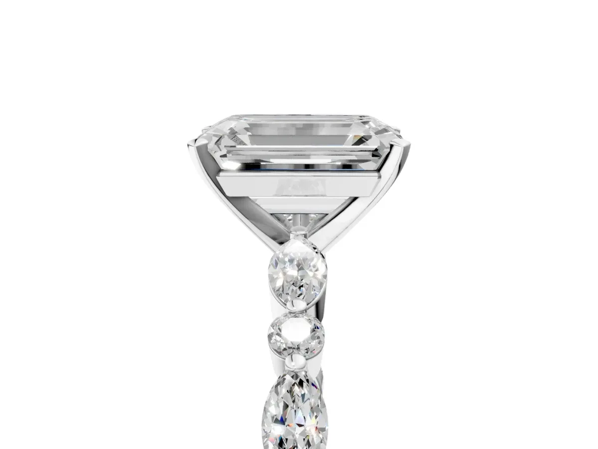 Emerald Cut Diamond Ring with Marquise and Round Side Stones and Four-Prong Setting Silver