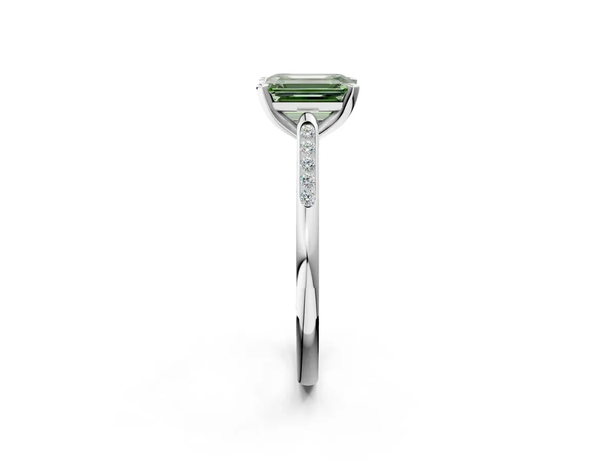 Fancy Green Emerald Cut Diamond Solitaire Ring with Channel Set Round Band and Prong Setting Silver