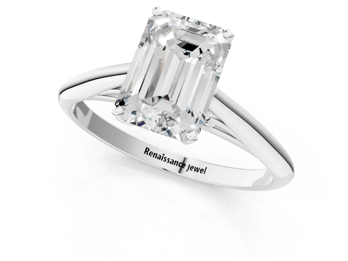 Emerald Cut Diamond Solitaire Engagement Ring with Cathedral Setting and Four-Prong Mount White gold