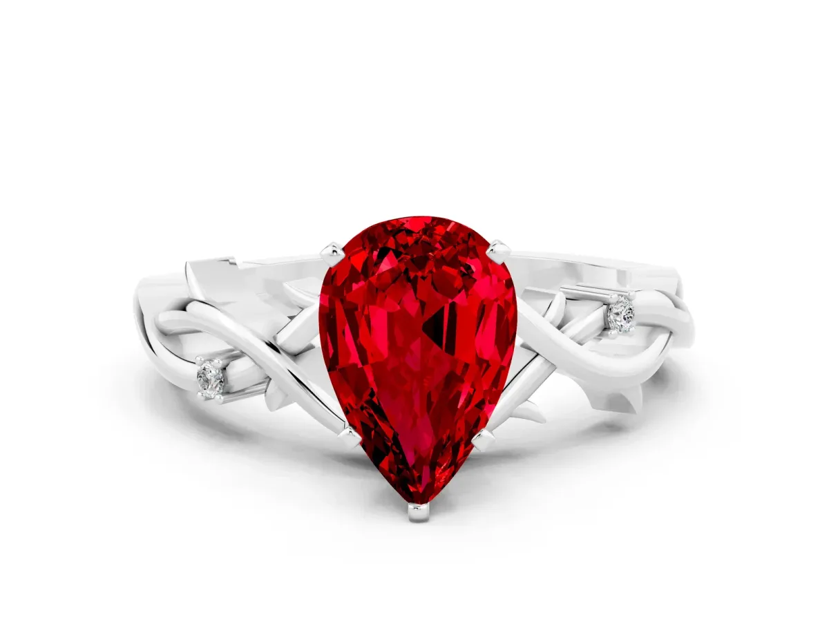 Pear Cut Ruby Solitaire Ring with Twisted Band and Prong Setting Silver