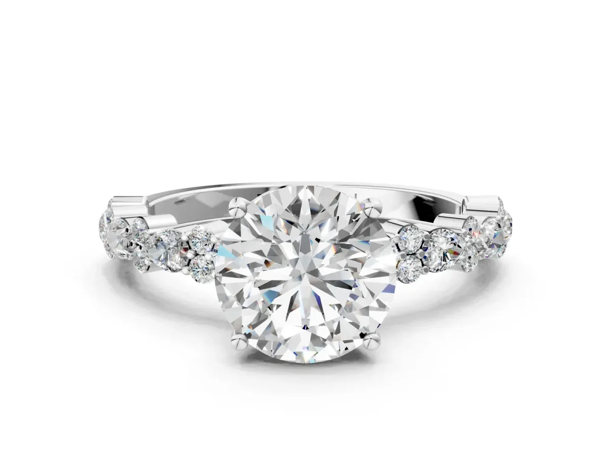 Round Cut Diamond Side Stone Solitaire Ring with Round and Four-Prong Setting White gold