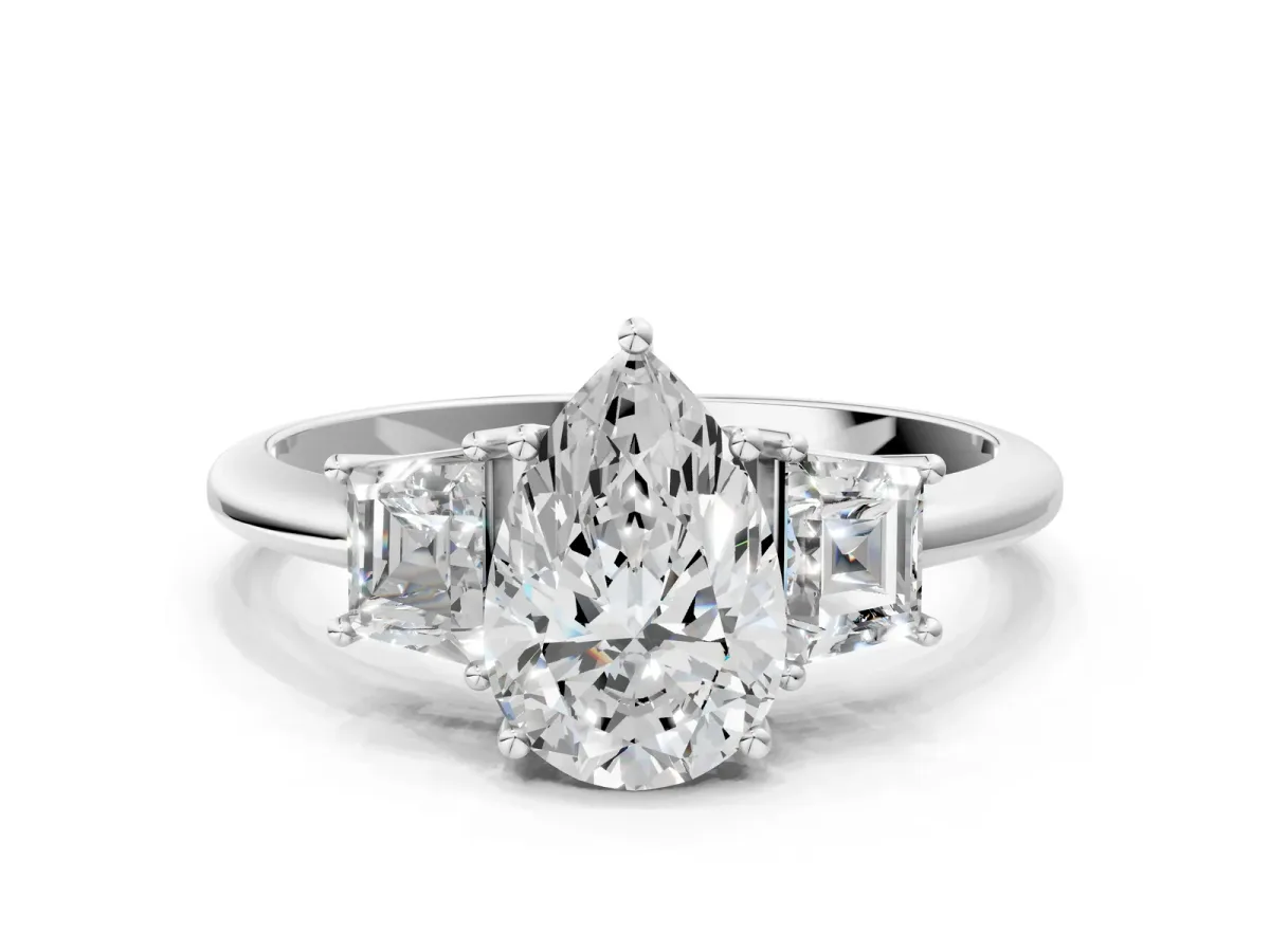 Pear Cut Diamond Three-Stone Ring with Trapezoid Side Stones and Prong Setting White gold