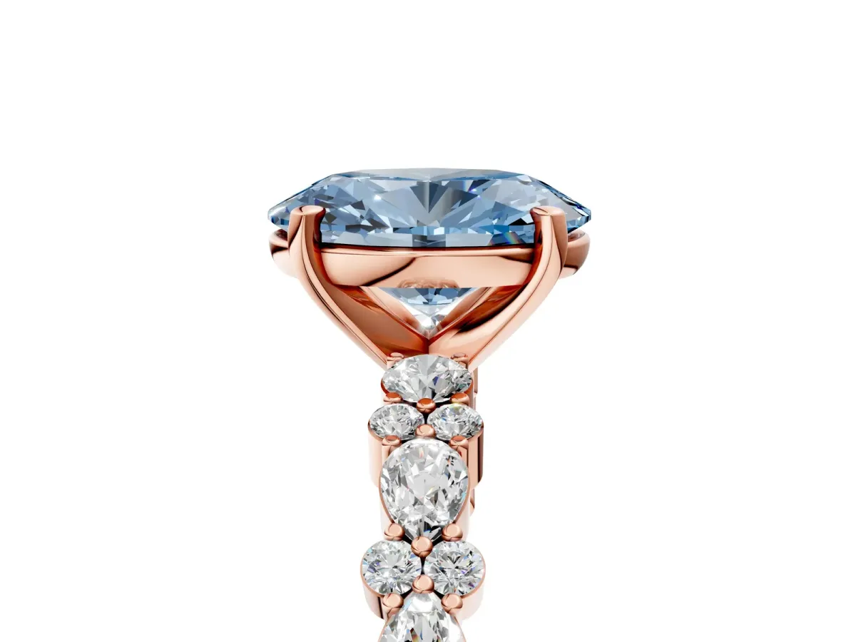 Fancy Blue Oval Cut Diamond Side Stone Solitaire Ring with Round and Four-Prong Setting Rose gold