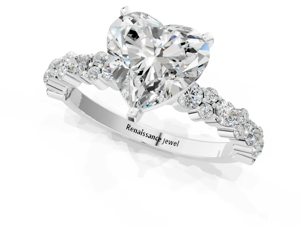 Heart Cut Diamond Side Stone Solitaire Ring with Round and Four-Prong Setting White gold