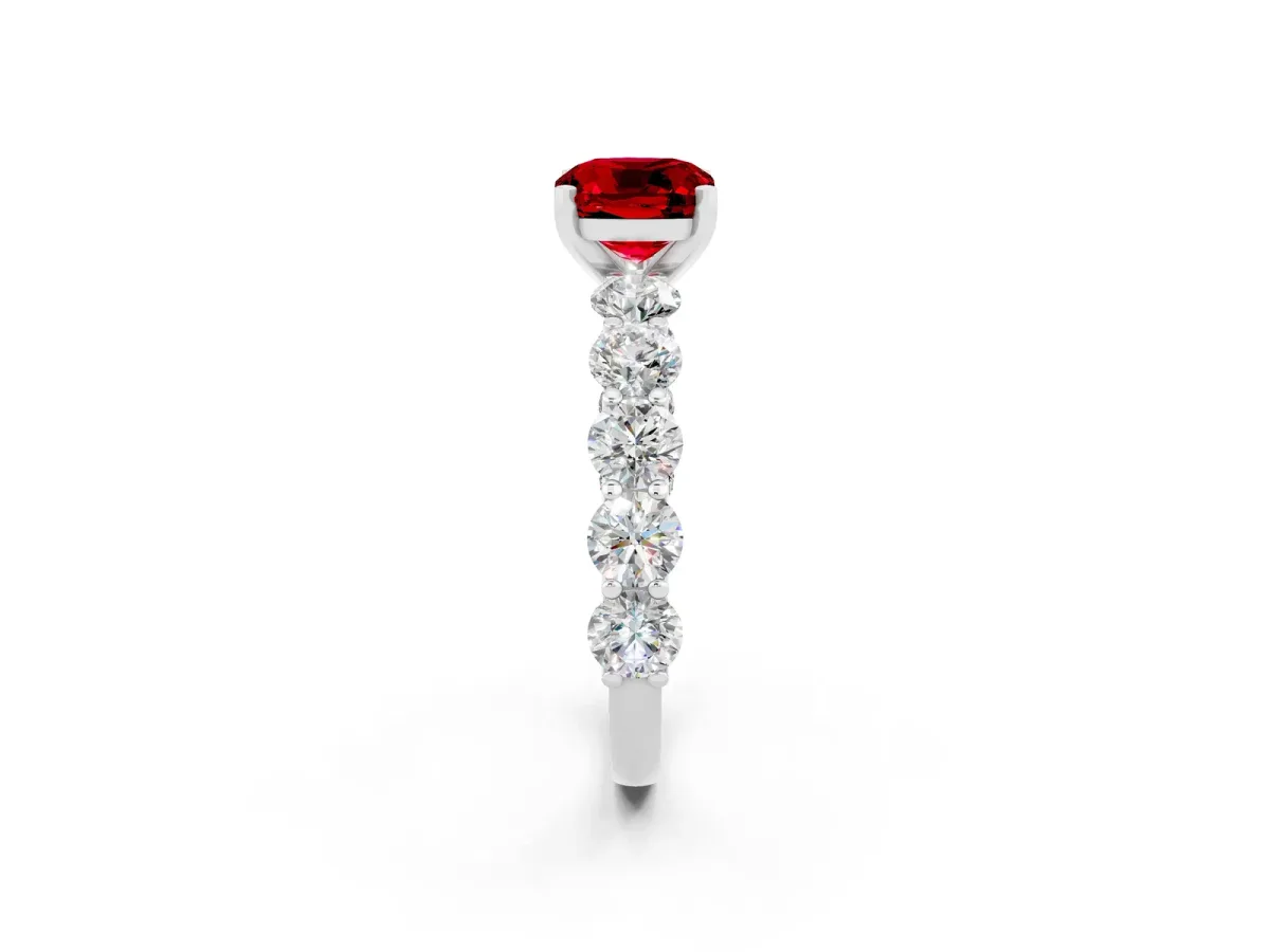 Cushion Cut Ruby Prong Setting with Side Stones on a Pave Band Silver