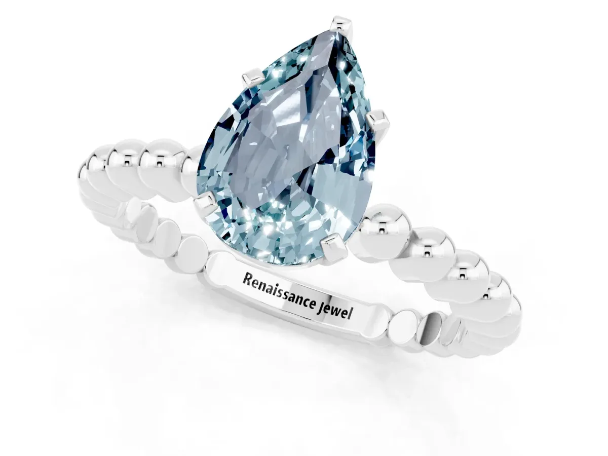 Pear Cut Aquamarine Solitaire Ring with Beaded Band and Prong Setting Silver