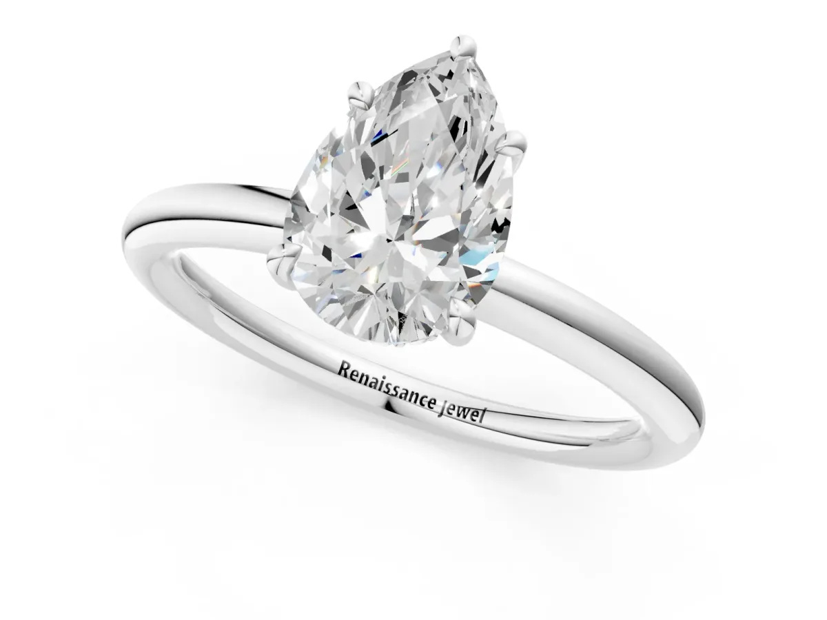 Pear Cut Diamond Solitaire Ring with Thin Band and Four-Prong Setting Silver