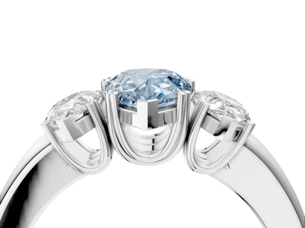 Fancy Blue Three-Stone Pear Cut Cut Diamond Ring with Channel Set Band and Four-Prong Setting Silver