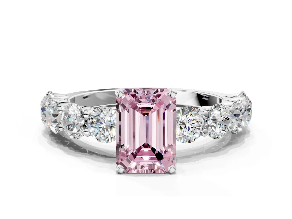 Fancy Pink Emerald Cut Diamond Prong Setting with Side Stones on a Pave Band Platinum