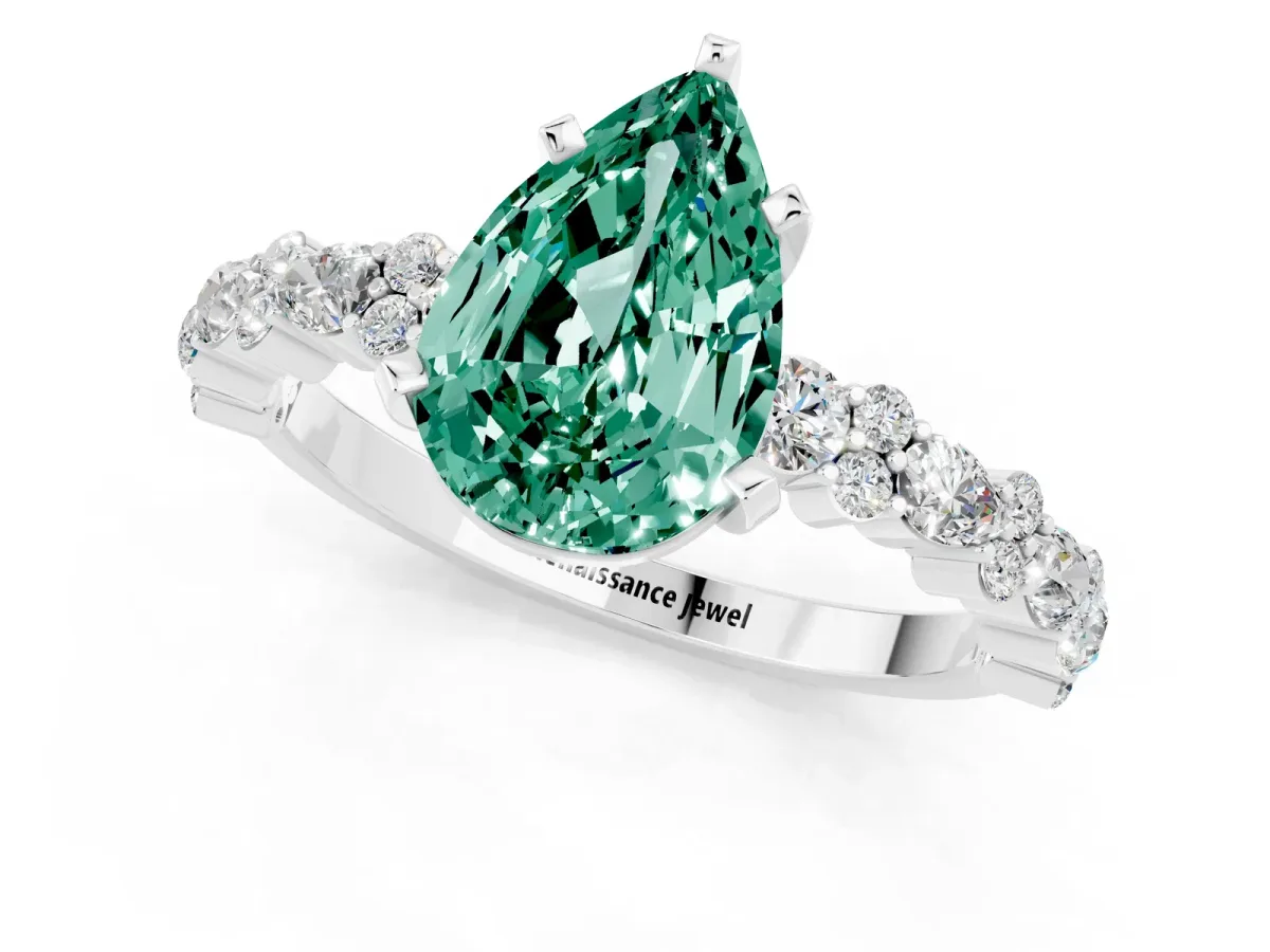 Pear Cut Green Sapphire Side Stone Solitaire Ring with Round and Four-Prong Setting Platinum