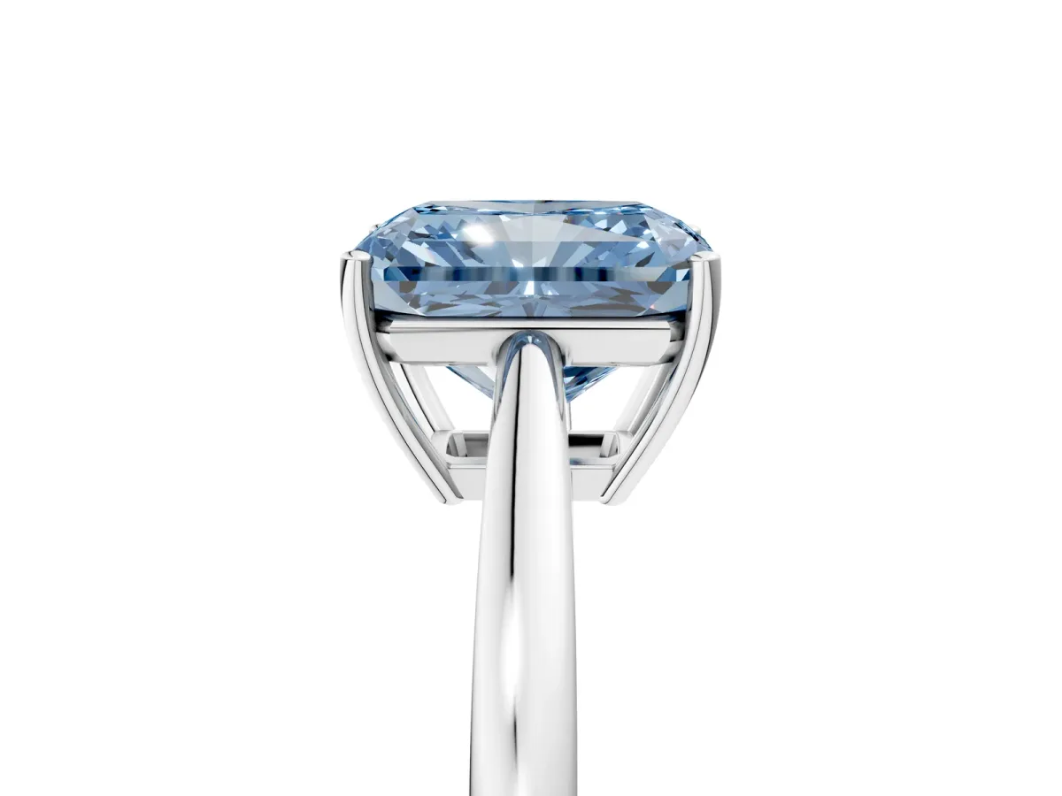 Fancy Blue Radiant Cut Solitaire Diamond Ring with Split Shank and Four-Prong Setting Platinum