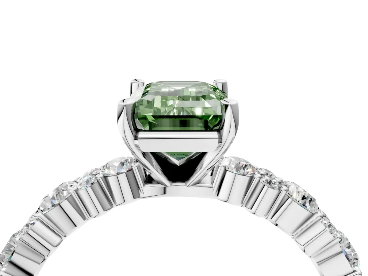 Fancy Green Emerald Cut Diamond Side Stone Solitaire Ring with Round and Four-Prong Setting White gold
