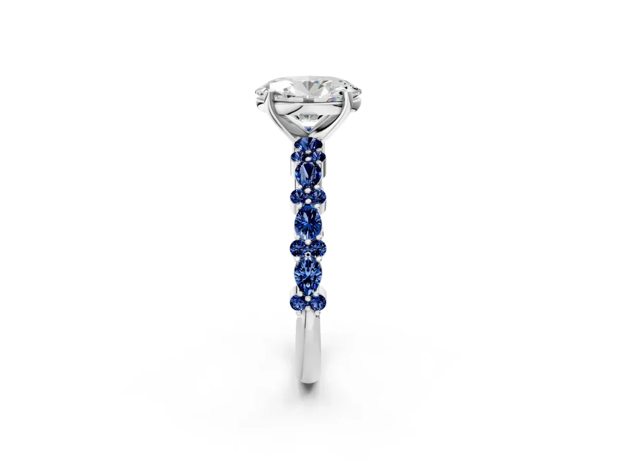 Oval Cut Diamond Side Stone Solitaire Ring with Round Blue Sapphire and Four-Prong Setting Silver