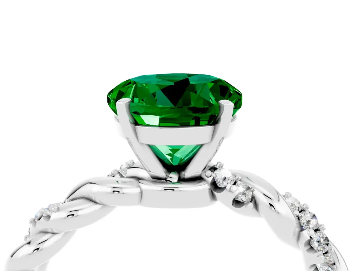 Round Cut Emerald Solitaire Ring with Twisted Band and Pavé Accents Silver
