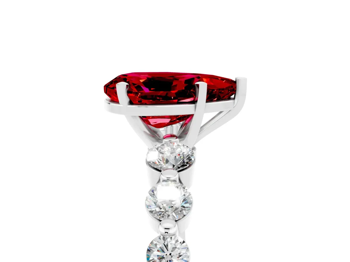 Pear Cut Solitaire Ruby Ring with Pave Band and Four-Prong Setting Platinum