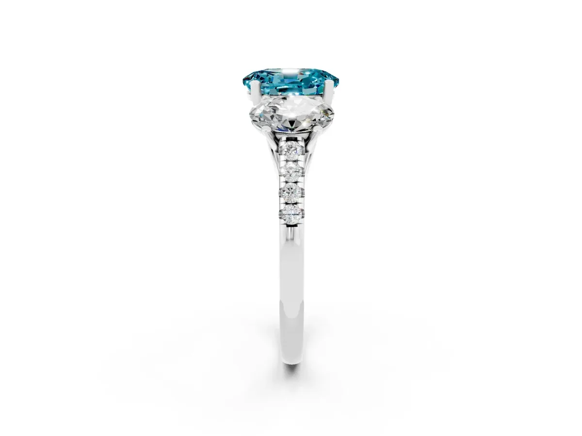 Three-Stone Oval Cut Blue Topaz Ring with Round Pavé Band and Prong Setting Platinum
