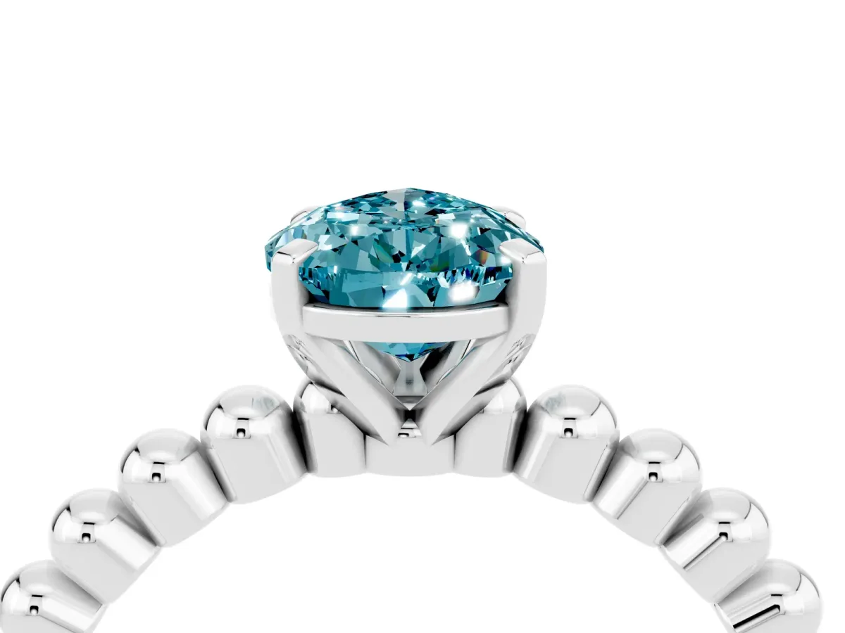 Pear Cut Blue Topaz Solitaire Ring with Beaded Band and Prong Setting Silver