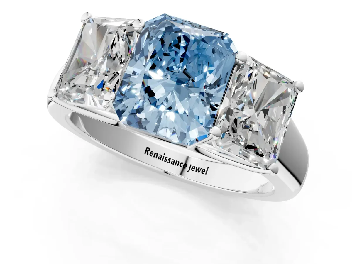 Fancy Blue Radiant Cut Three-Stone Diamond Ring with Prong Setting on a Classic Band Platinum