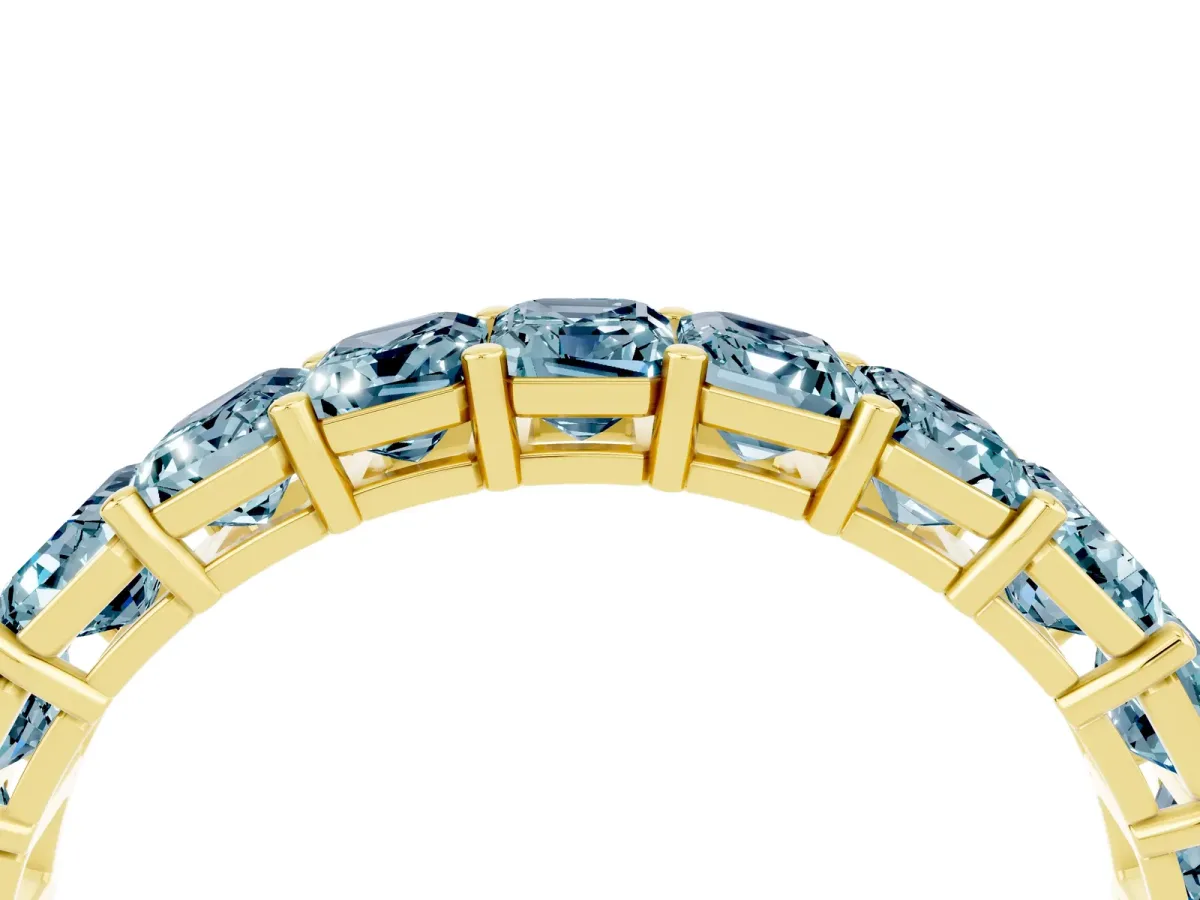 Emerald Cut Aquamarine Eternity Band with Shared Prong Setting Yellow gold