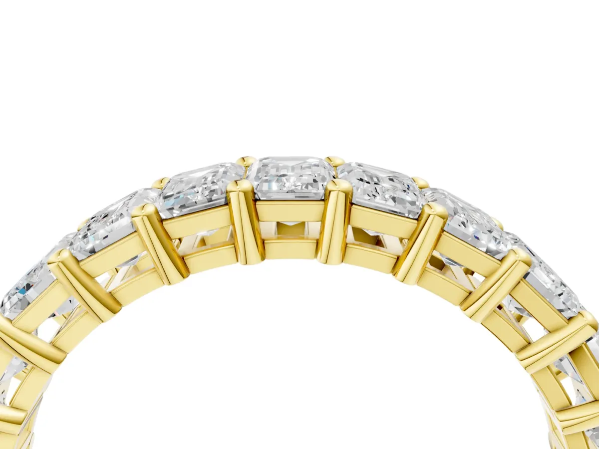 emerald Cut half eternity band with shared prong setting Yellow gold