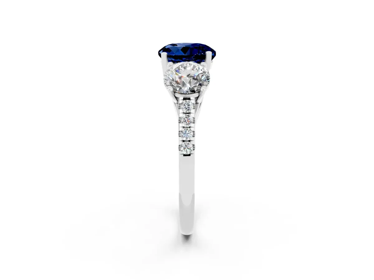 Three-Stone Round Cut Blue Sapphire Ring with Round Pavé Band and Prong Setting Silver