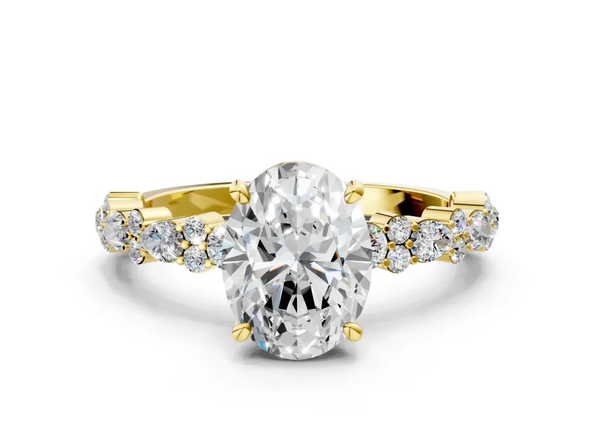 Oval Cut Diamond Side Stone Solitaire Ring with Round and Four-Prong Setting Yellow gold