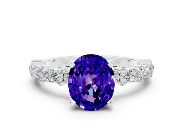 Oval Cut Tanzanite Side Stone Solitaire Ring with Round and Four-Prong Setting White gold