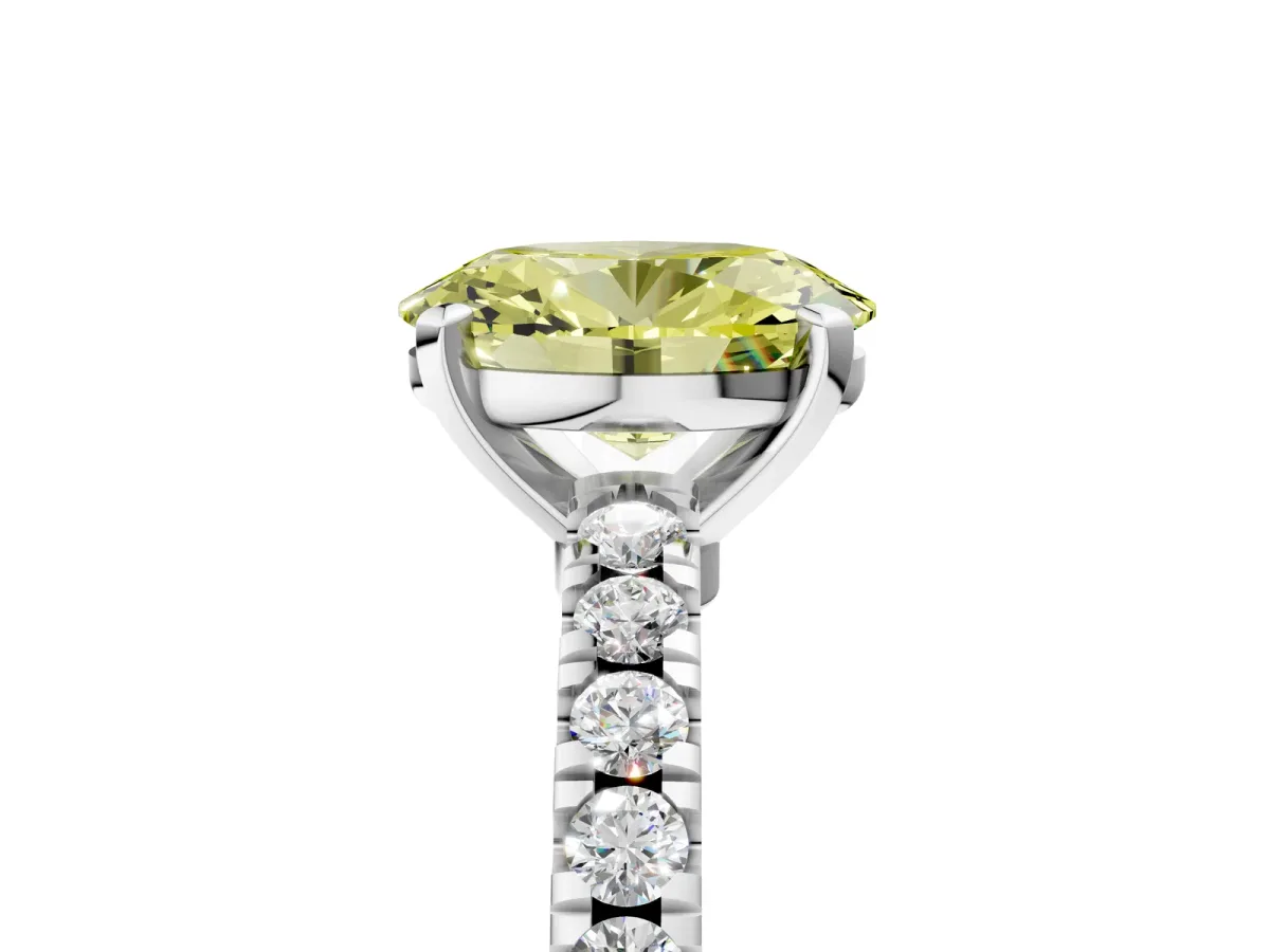 Fancy Yellow Oval Cut Solitaire Diamond with Pavé Band and Four-Prong Setting Silver