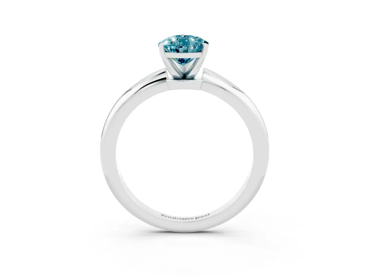 Pear Cut Blue Topaz Solitaire Ring with Six-Prong Setting and Classic Band Silver