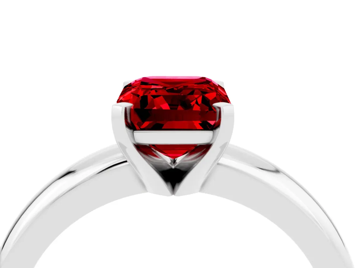 Emerald Cut Ruby Solitaire Engagement Ring with Round Band and Four-Prong Setting Silver