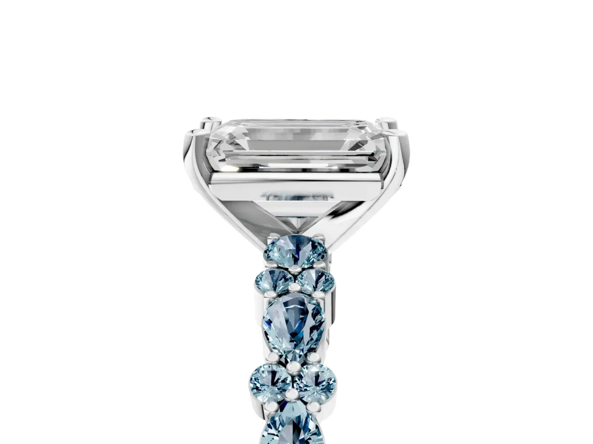 Emerald Cut Diamond Side Stone Solitaire Ring with Round Aquamarine and Four-Prong Setting Silver