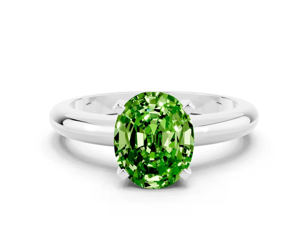 Oval Cut Peridot Solitaire Engagement Ring with Round Band and Four-Prong Setting Silver