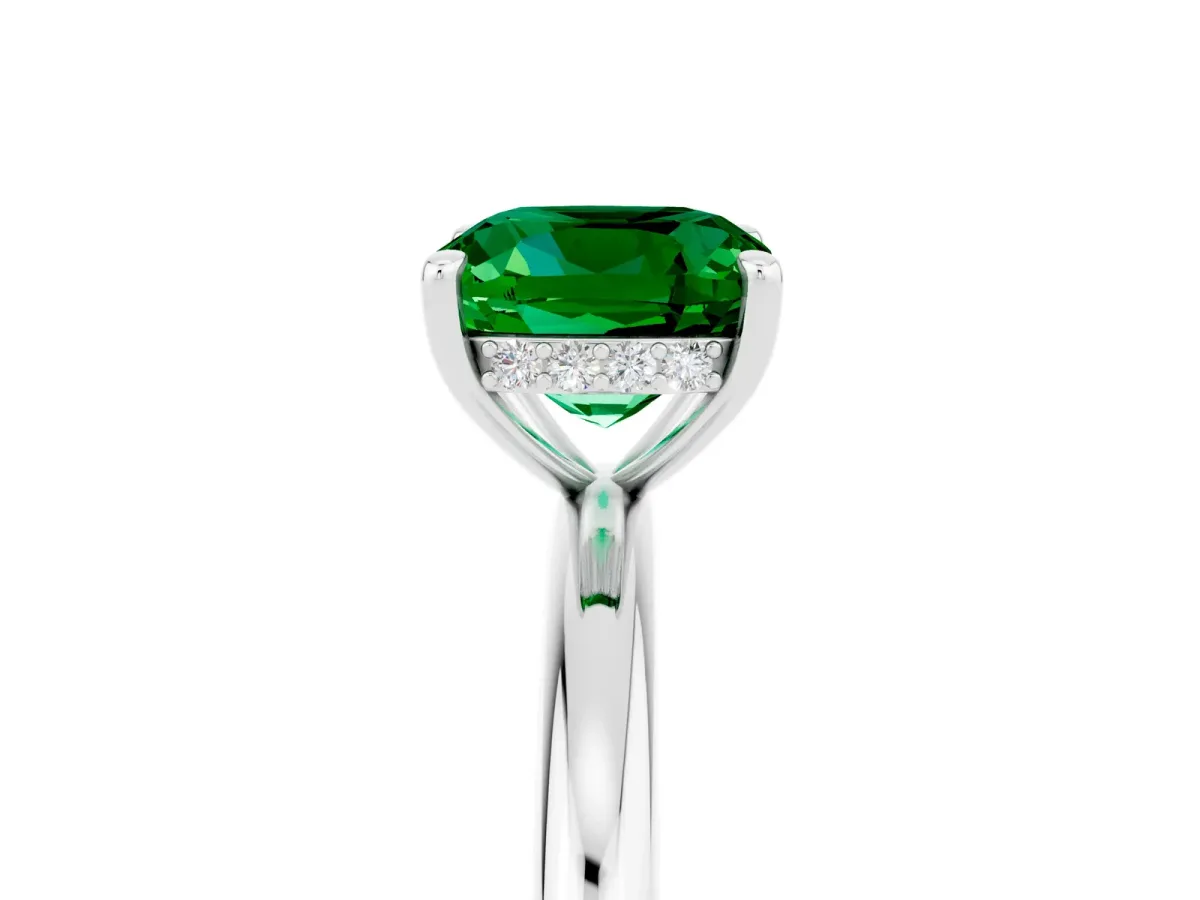 Cushion Cut Emerald Solitaire Ring with Thin Band and Four-Prong Setting Platinum
