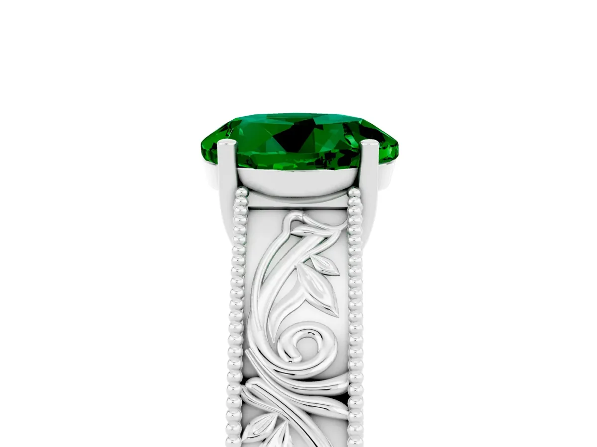 Round Cut Emerald Solitaire Ring with Engraved Band and Four-Prong Setting White gold