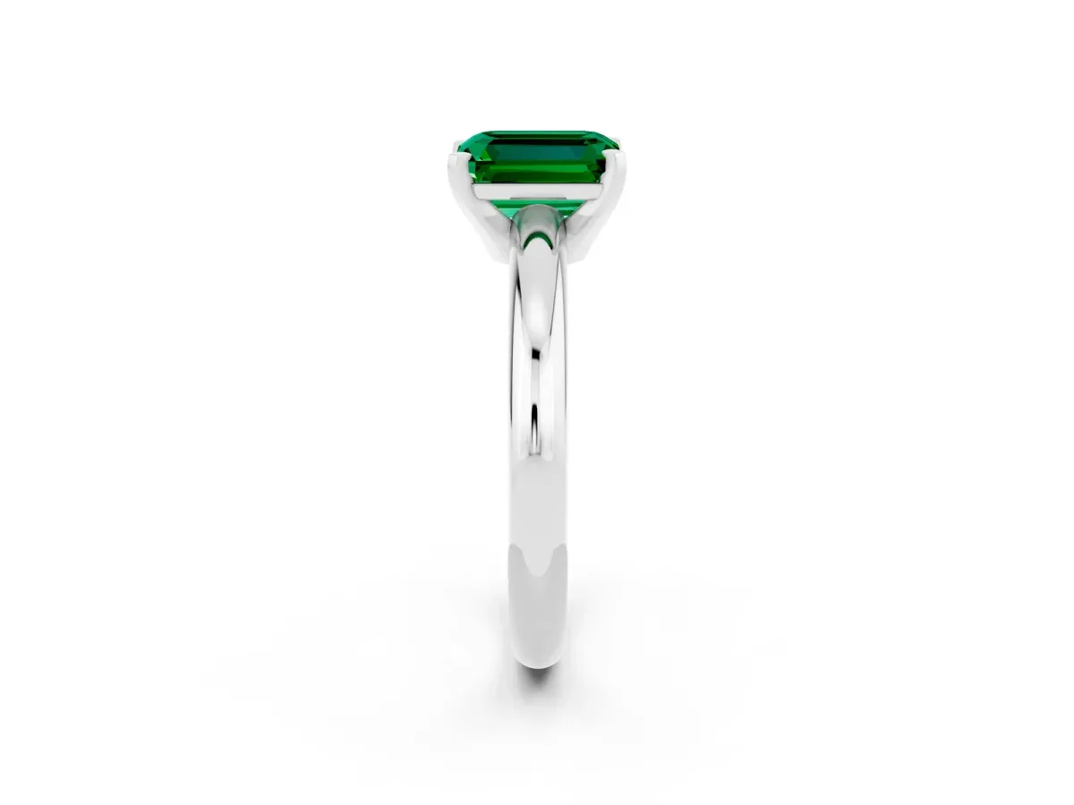 Emerald Cut Emerald Solitaire Engagement Ring with Round Band and Four-Prong Setting Silver