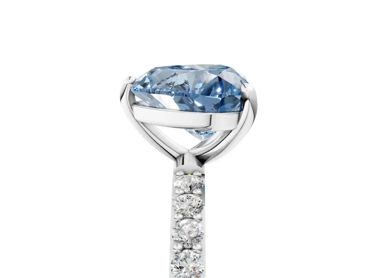 Fancy Blue Heart Cut Diamond Solitaire Ring with Round Pavé Band and Prong Setting Silver