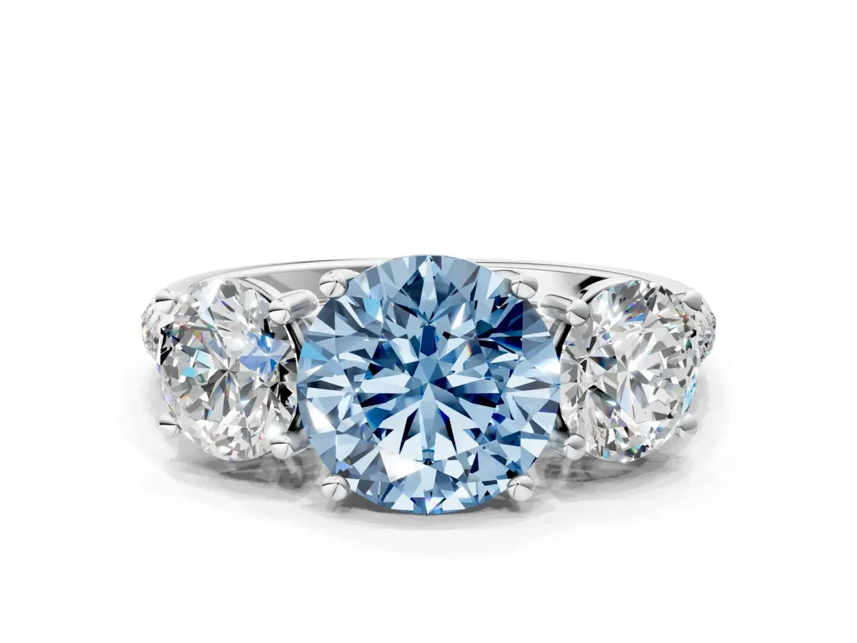 Fancy Blue Three-Stone Round Cut Diamond Ring with Round Pavé Band and Prong Setting Platinum