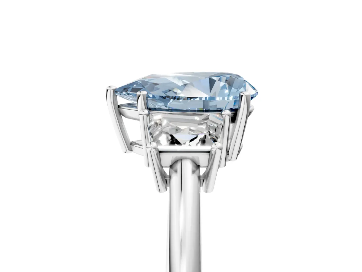Fancy Blue Pear Cut Diamond Three-Stone Ring with Trapezoid Side Stones and Prong Setting Platinum