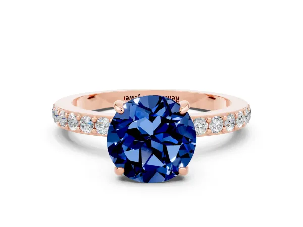 Round Cut Blue Sapphire Solitaire Engagement Ring with Pavé Band and Four-Prong Setting Rose gold