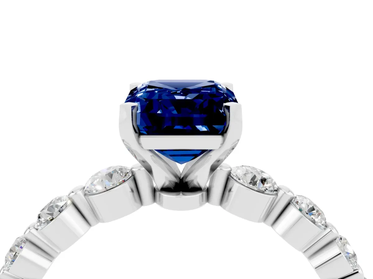Emerald Cut Solitaire Blue Sapphire Ring with Pave Band and Four-Prong Setting Silver