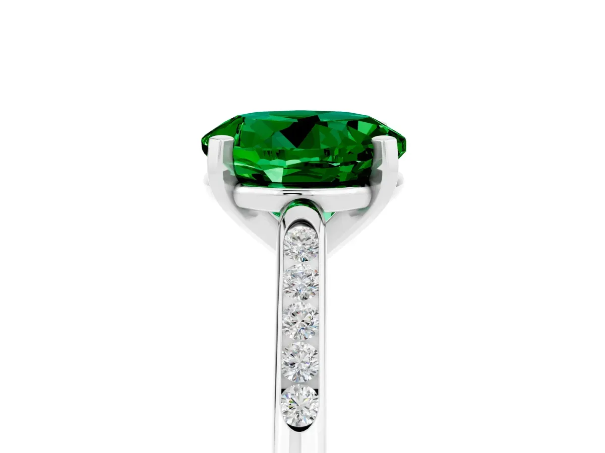Round Cut Emerald Solitaire Ring with Channel Set Round Band and Prong Setting Platinum