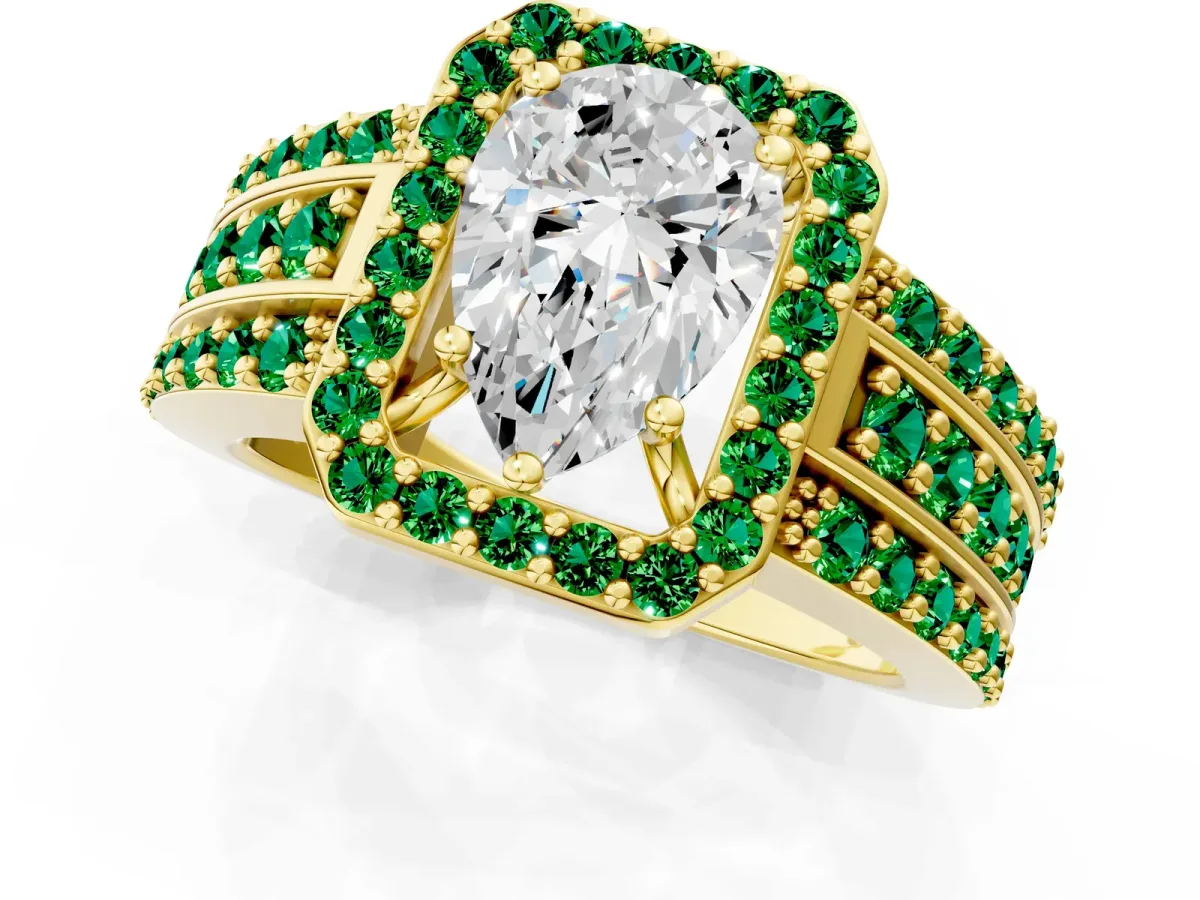 Pear Cut Halo Diamond Ring with Round Emerald Split Shank and Prong Setting Yellow gold