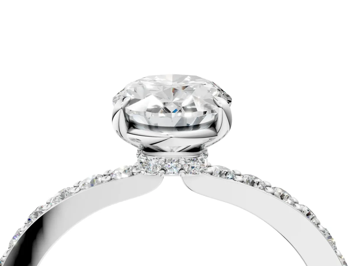 Oval Cut Diamond Solitaire Engagement Ring with Pavé Band and Four-Prong Setting Silver
