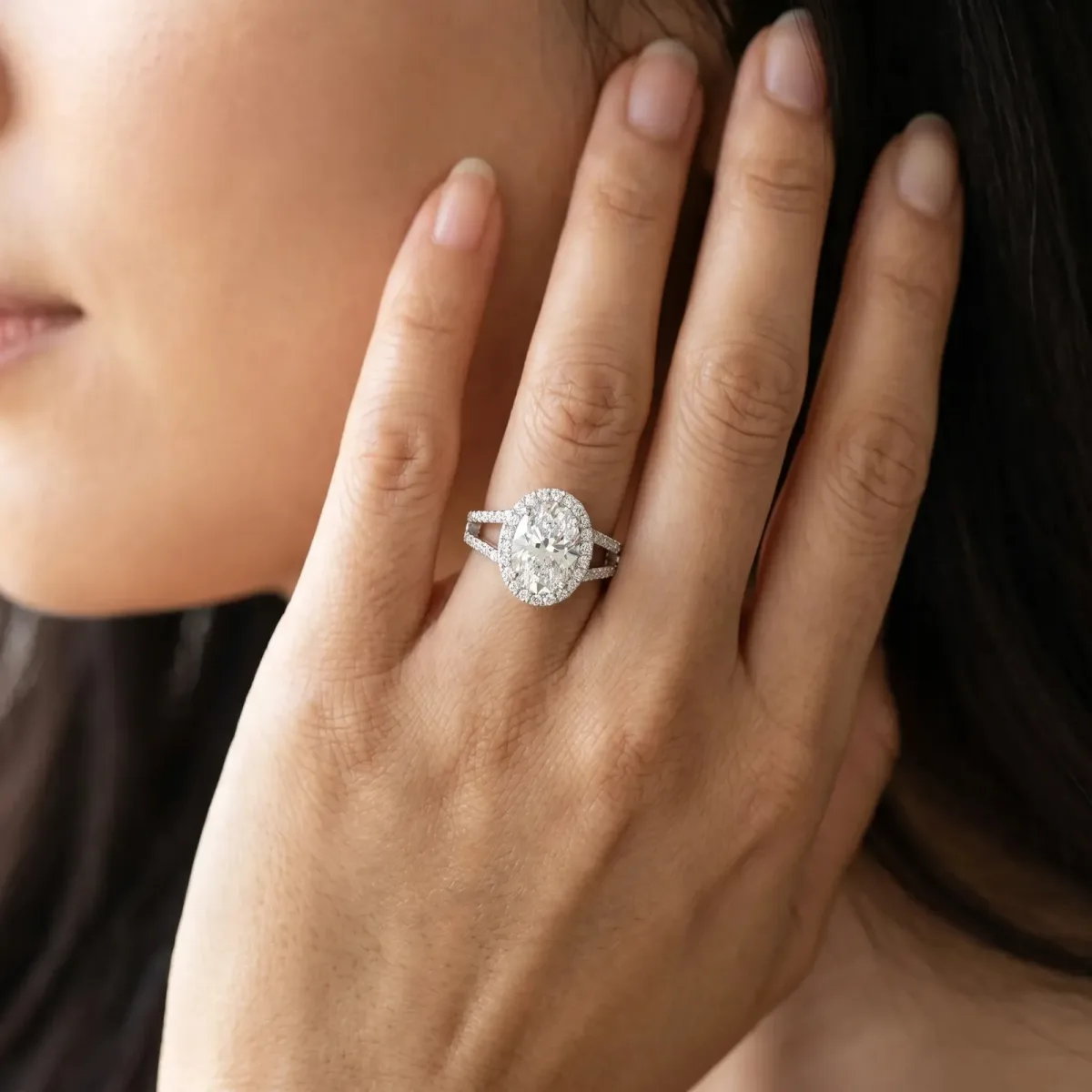 Oval Cut Diamond Halo Ring with Split Shank U-Prong Band and Four-Prong Setting Silver