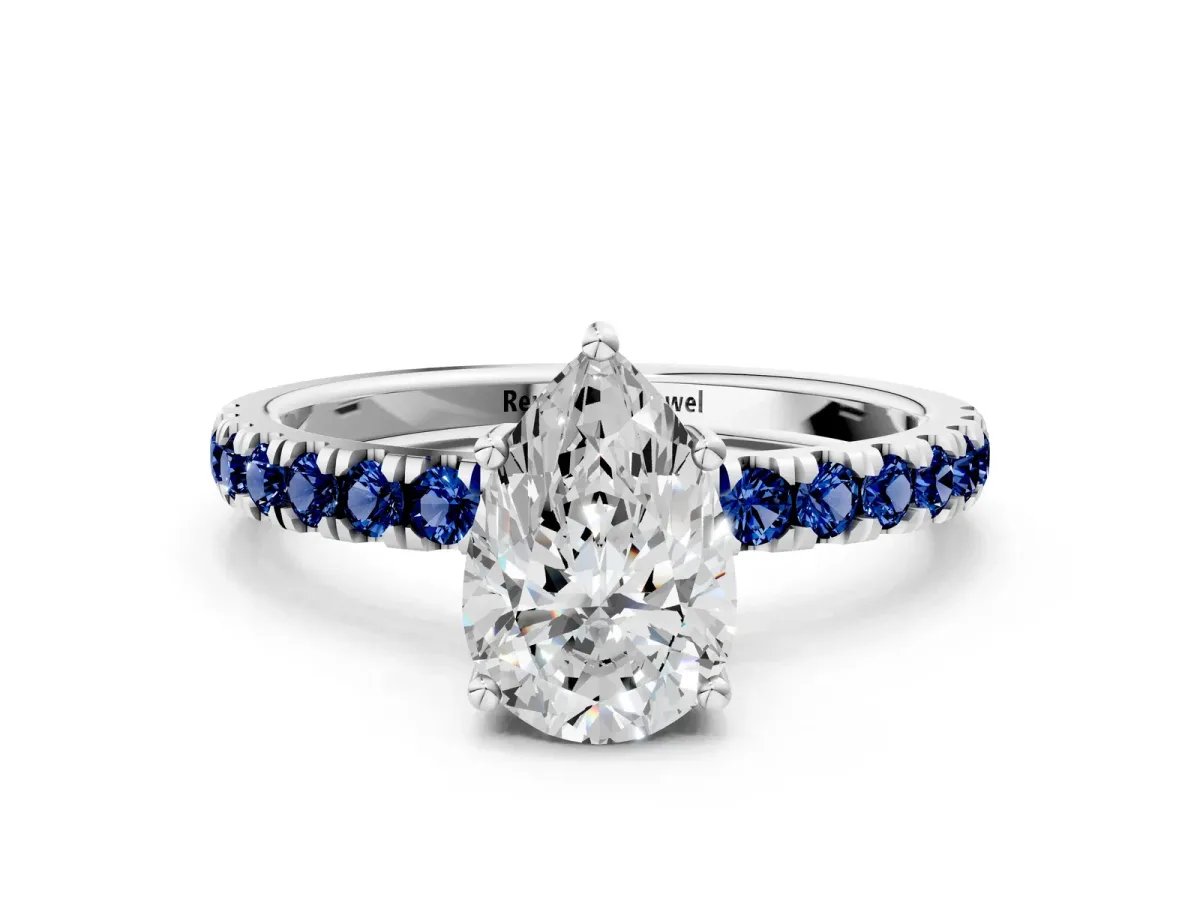 Pear Cut Diamond Pave Band Solitaire Ring with Round Blue Sapphire and Prong Setting Silver