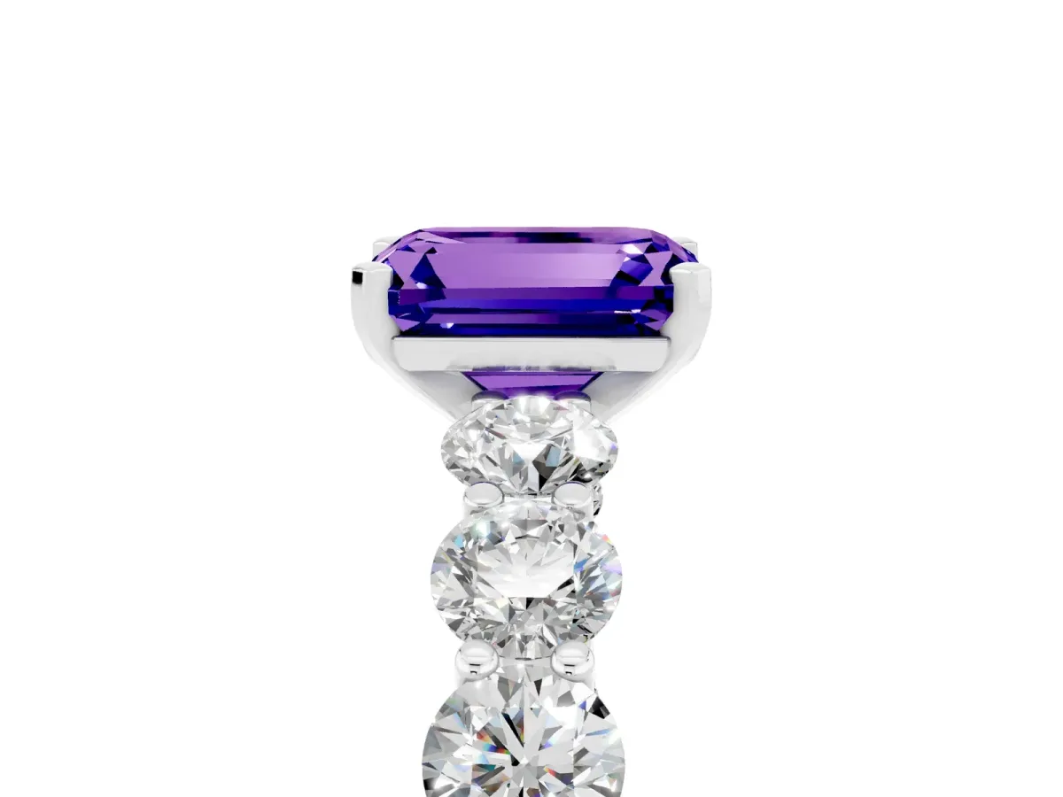 Emerald Cut Tanzanite Prong Setting with Side Stones on a Pave Band Silver
