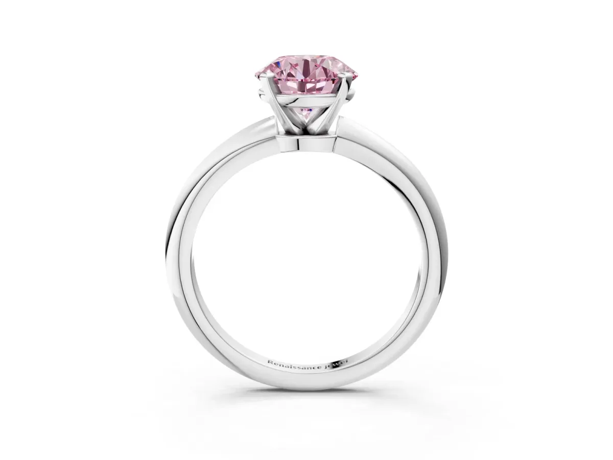 Fancy Pink Round Cut Diamond Solitaire Ring with Six-Prong Setting and Classic Band Silver