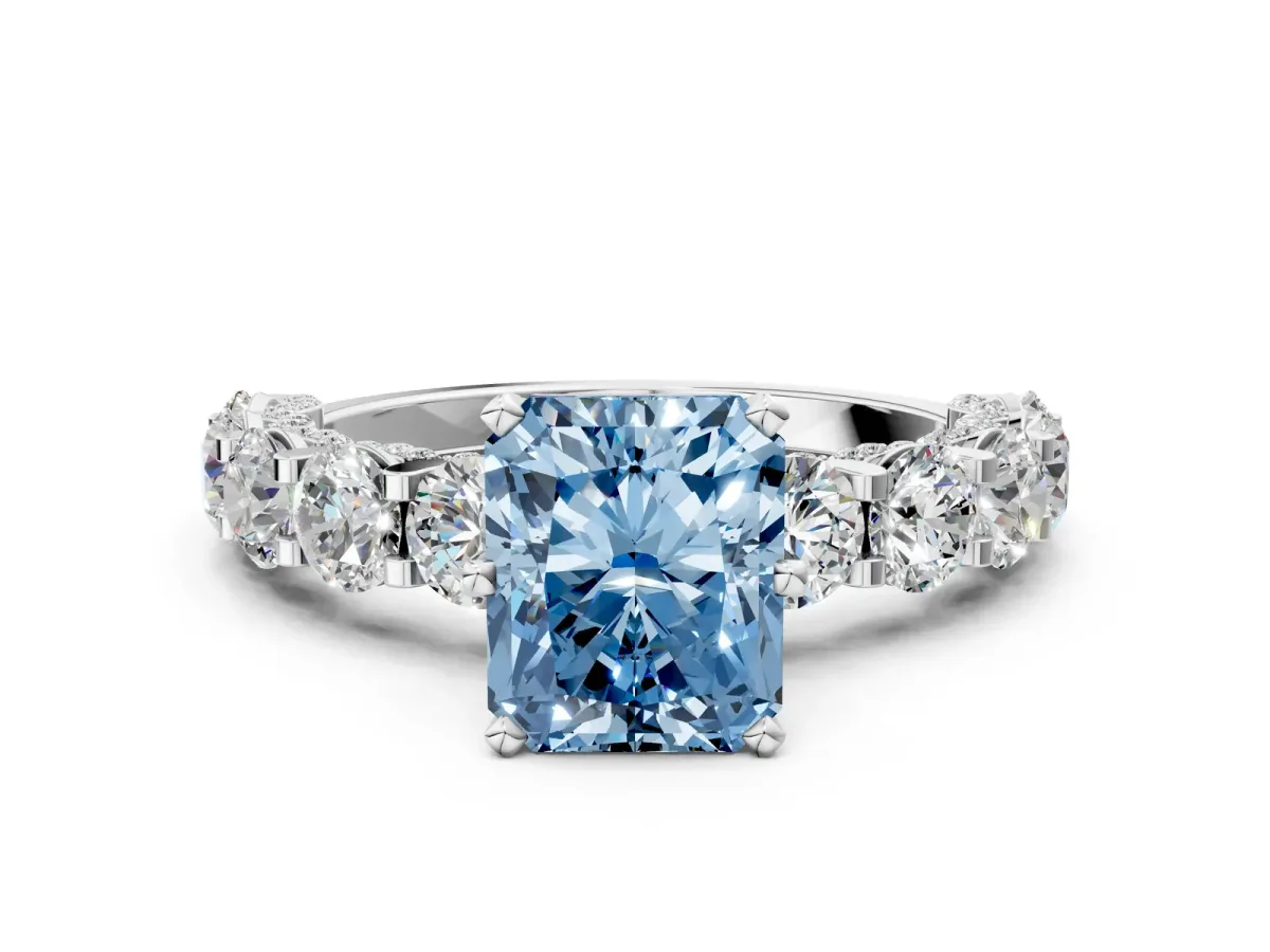 Fancy Blue Radiant Cut Diamond Side Stone Engagement Ring with Four-Prong Setting White gold