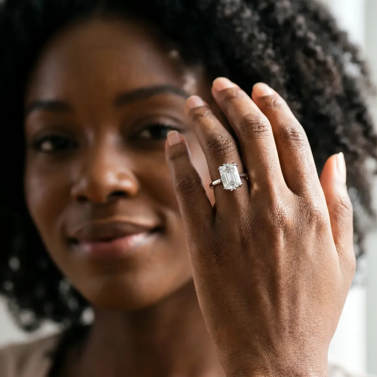 Emerald Cut Diamond Solitaire Ring with Flower Prong Setting and Classic Band Silver
